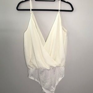 off white/cream bodysuit/onesie